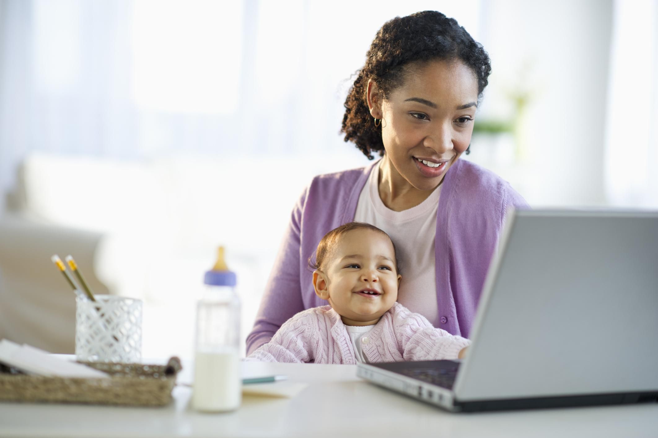 Mother and child with laptop